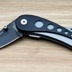 SKELETON LINER LOCK KNIFE WITH CARABINER