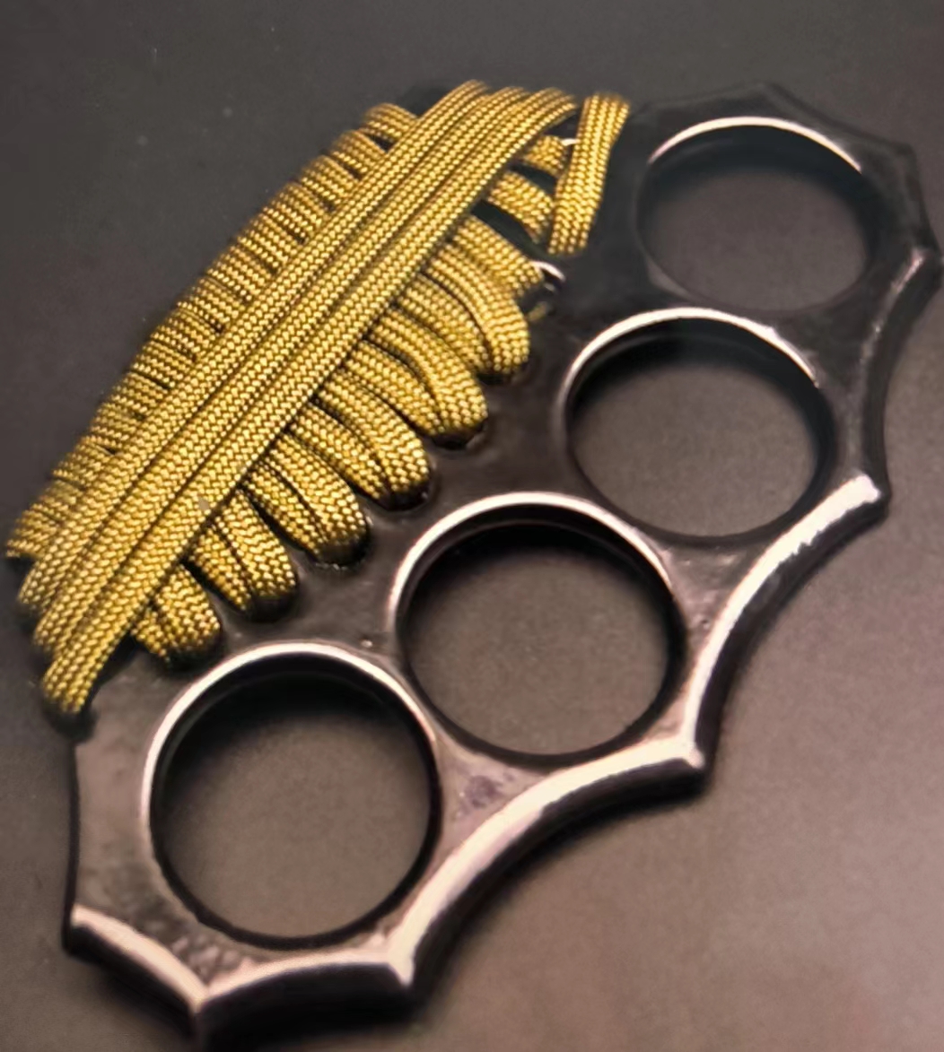 K6 PARACORD WRAPPED KNUCKLE - PAPER WEIGHT - Image 1